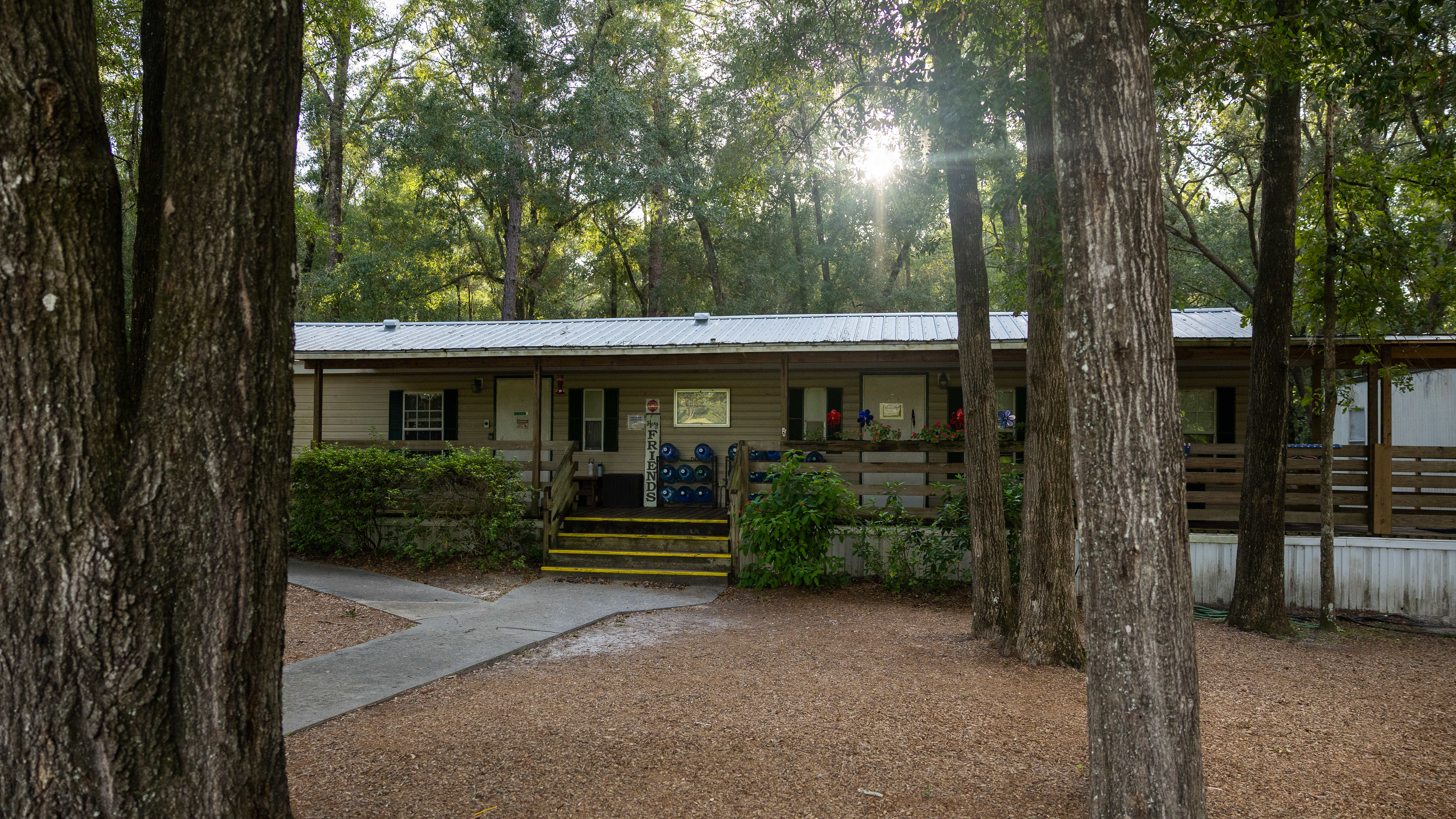 Living Springs Academy campus beneath the trees